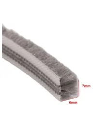 Brush gasket for doors and...