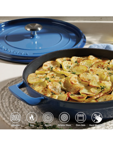 Low casserole dish with lid made of blue enamelled cast iron